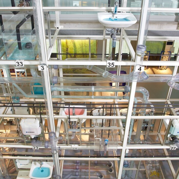 A water tower with transparent pipes to show the water movment.