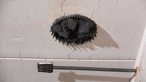 Fire protection sleeve that was triggered and closed off the pipe.