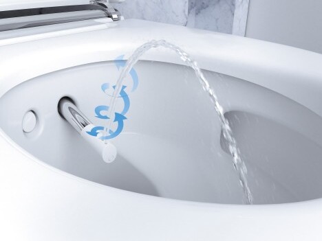 A modern toilet with a shower function, with blue arrows indicating the direction of water flow.