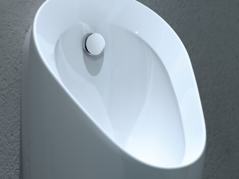 A modern white urinal mounted on a wall.
