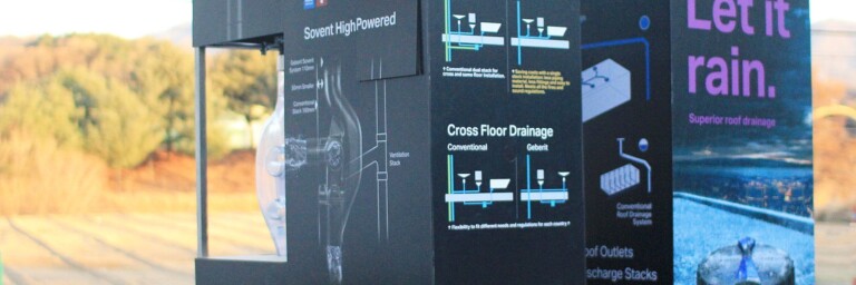 Displays of Geberit products featuring diagrams for space-saving drainage systems.