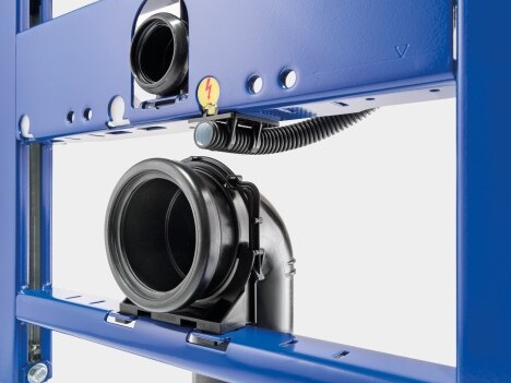 A close-up view of a blue metal framework featuring black pipe connections.