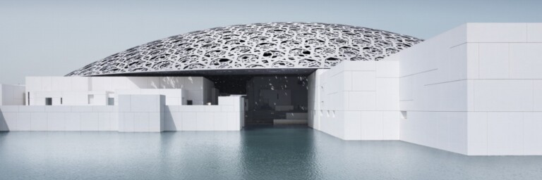 Louvre Abu Dhabi featuring a modern dome structure over a reflective water surface.