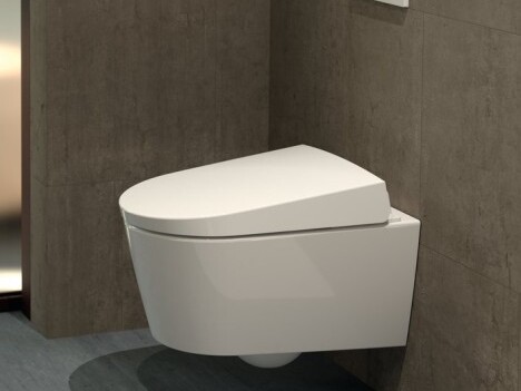 Ein modernes hängendes Toilettendesign in einem Badezimmer mit grauen Wänden.