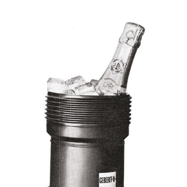 A black pipe with a champagne and ice in it.