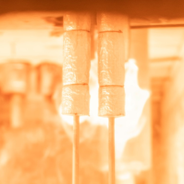 A look inside the furnace, with two FlowFit pipes at the front