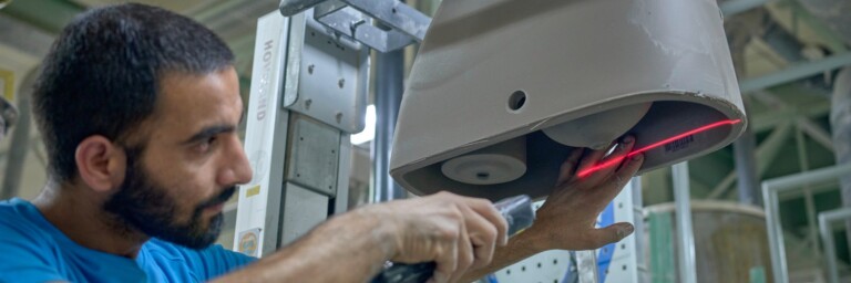 An employee scans the barcode.