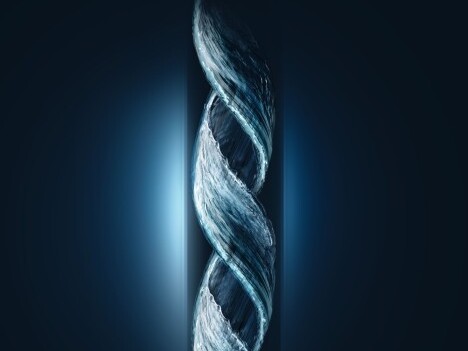 A swirling strand resembling a water flow, illuminated against a dark background.